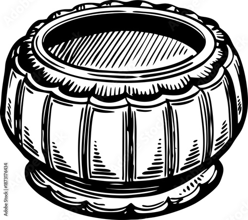 Ornate decorative bowl with carved details and rounded base in vintage