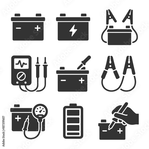 Set of car battery and charging icons in black and white silhouettes.