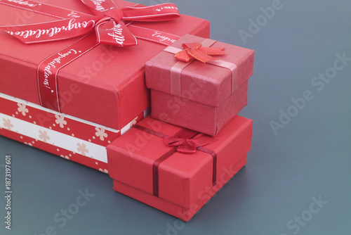 Foto Gift boxes on blue background. Birthday and resent concept.