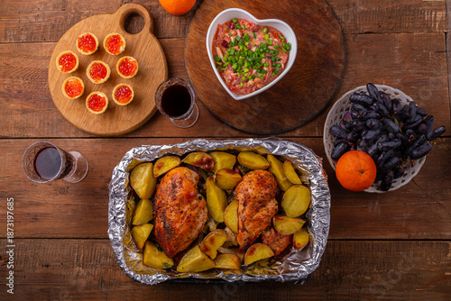 Red caviar tartlets and heart-shaped salad Baked chicken breast