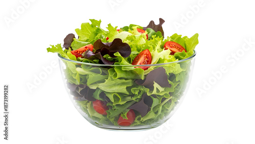 A glass bowl filled with mixed greens salad and vegetables isolated on transparent background