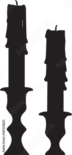 Silhouette of two candles