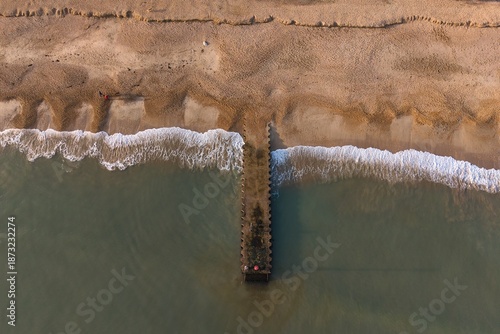 Tableau sur toile Winter Sunset Over Ballesdale Jetty, Weymouth Dorset Aerial View