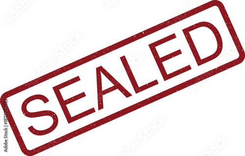 A prominent red rectangular rubber stamp displaying the word SEALED diagonally on a clean white surface