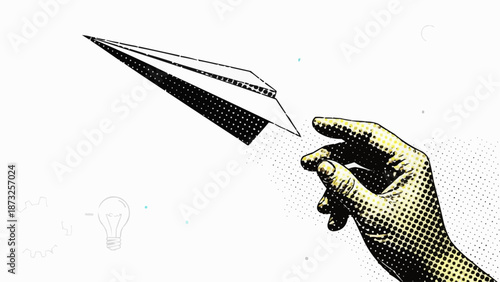 Hand launching a paper airplane in flight.