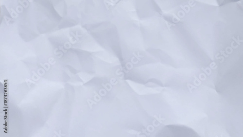
​White crumpled paper texture background. Abstract, distressed, and wrinkled surface for a simple, minimal backdrop or overlay.