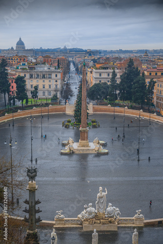 Christmas cityscape of Rome: the Piazza del Popolo (People's Square) on a rainy day.