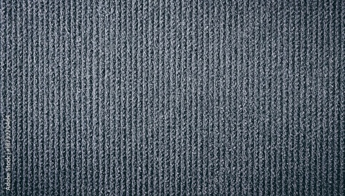 Dark Textured Surface With Uniform Pattern Captured in Natural Light