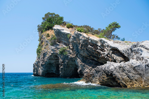 Rock with caves in the sea