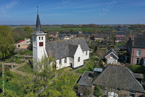 White church in the northern Dutch village of Hauwert in the Netherlands. Photo taken with a drone.