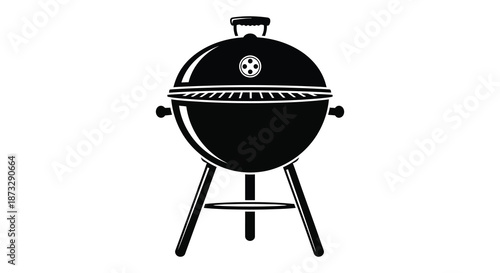 A striking black and white image of a classic kettle style barbecue grill silhouette
