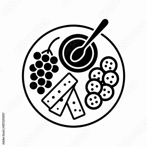 A classic snack platter featuring grapes, crackers, and dip, perfect for entertaining