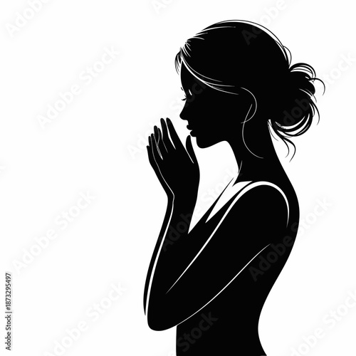 This elegant black silhouette of a woman with hands poised in prayer highlights introspection, serenity, and the inner connection between mind and spirit.