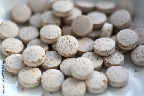 Heap of brewer´s yeast pills as background