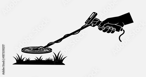 A gloved hand grasps a metal detector over a buried object in a grassy terrain illustration