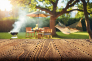 summer time in backyard garden with grill BBQ, wooden table, blurred background