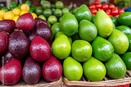 Ripening avocados displaying color transition at market stall