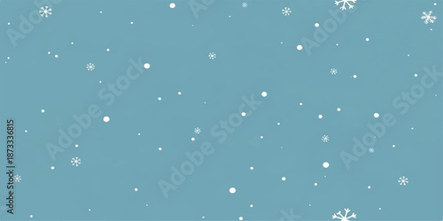 Snowflakes falling on a light blue background