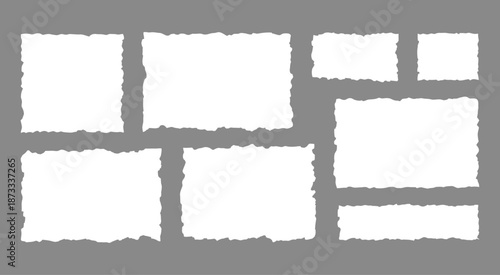 Collection of white torn paper shapes with rough edges a gray background ripped