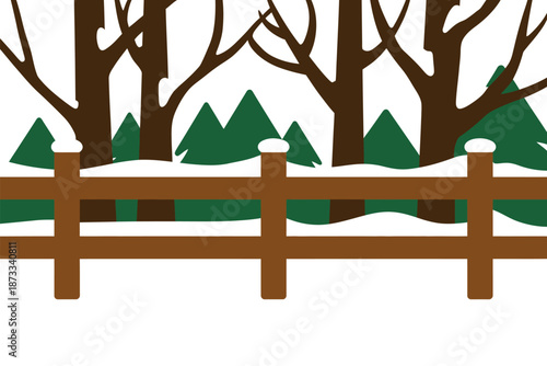 A brown wooden fence in a snowy landscape with trees and green bushes