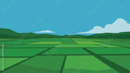 A serene landscape of green fields and hills under a blue sky with clouds