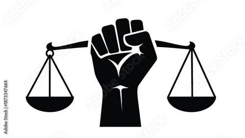 A raised fist powerfully holds the scales of justice symbolizing strength and equality