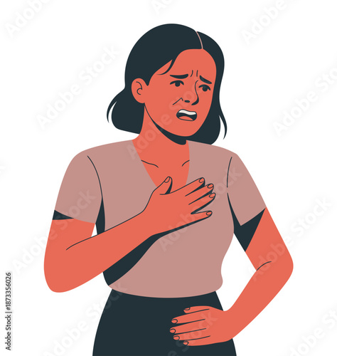 A worried woman clutching her chest in pain or distress indoors