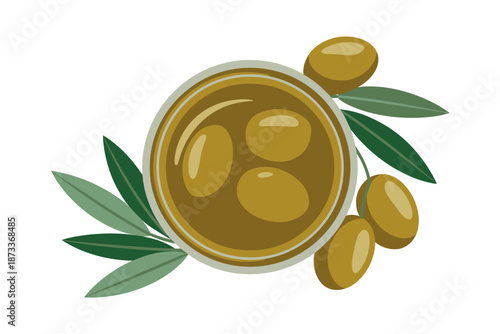 A bowl of olive oil with olives and leaves on a white background