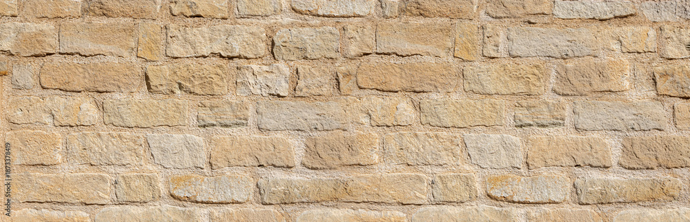 Fototapeta premium Old dry stone wall texture background showing masonry pattern