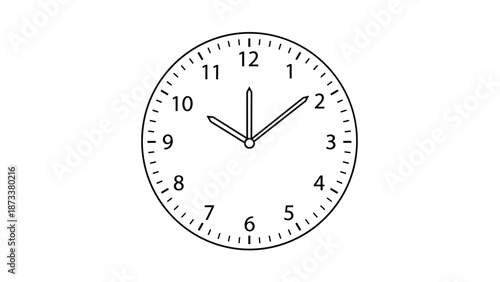 Clear analog clock face with black numbers and markings shows the time at approximately ten past ten with its long and short pointed hands.