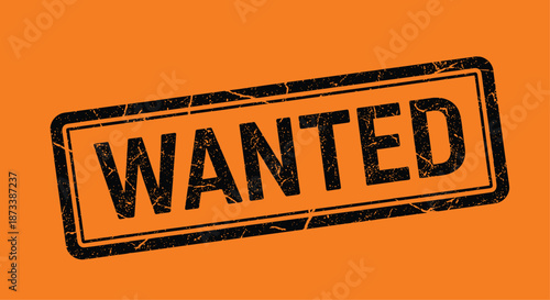 A bold black grunge rubber stamp with the word 'wanted', reminiscent of old western posters, on a solid bright orange background.