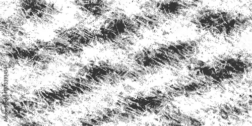 Vintage black and white fabric texture with a rough grunge pattern and dirty marble stone effect for a weathered wallpaper design surface
