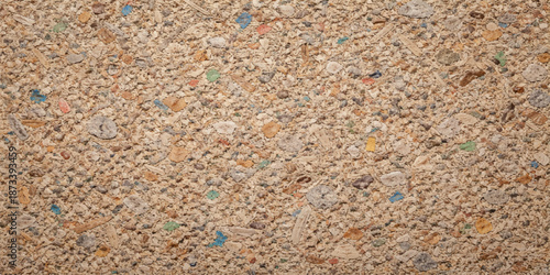 Abstract nature pattern of brown knitted wool texture and carpet surface featuring a close-up macro of natural white sand and stone pebble gravel wallpaper