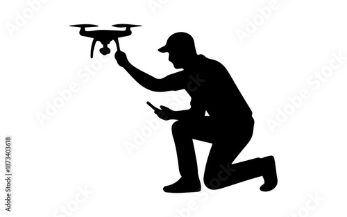 Drone pilot operating quadcopter using remote control