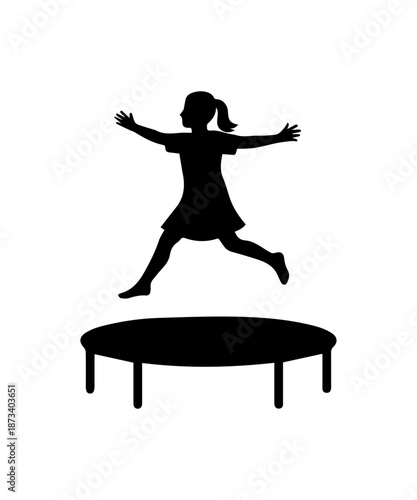 Girl child jumping on trampoline silhouette enjoying freedom and play