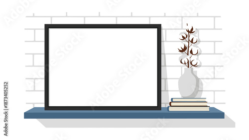 Minimalist blue shelf against a white brick wall, featuring a blank black picture frame, stacked books, and decorative cotton branches, providing a cozy home decor element.