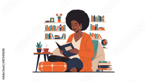 African American woman with afro hair comfortably sitting on a cushion, immersed in reading a book, surrounded by bookshelves.