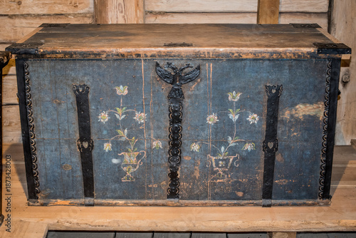 Old wooden chest against wooden wall