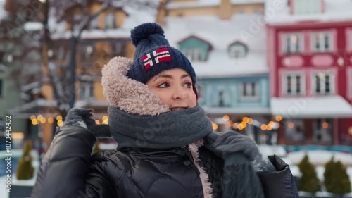 Wallpaper Mural Joyful winter setting, Young lady in winter attire surrounded by sparkling holiday surroundings Torontodigital.ca