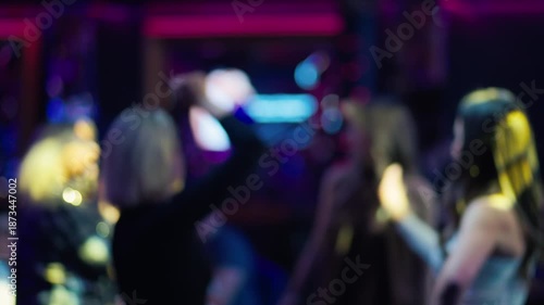 Wallpaper Mural Stylish group enjoying lively night, Bright pink lounge with animated conversations and neon effects Torontodigital.ca