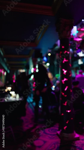 Wallpaper Mural Luminous corridor with stools and shadows, Quiet blue and magenta lights illuminate empty bar Torontodigital.ca