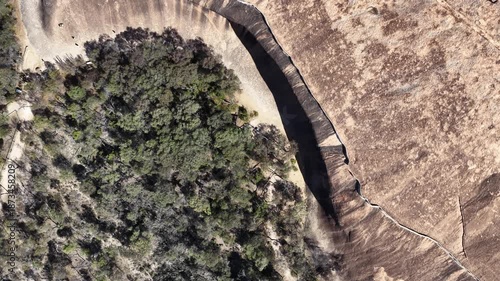 4K Aerial Drone Footage of Wave Rock, Hyden, Western Australia, Showing Granite Rock Formation, Dry Season Landscape, Arid Bushland, Rock Curves and Unique Geological Landmark