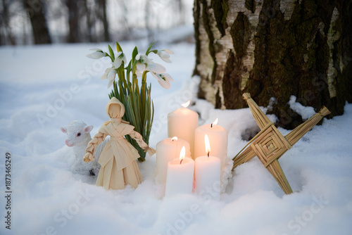 Schilderij op canvas Imbolc pagan ritual elements with brigid's cross and candles