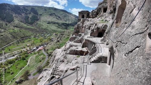 Vardzia, a 12th-century cave monastery in Georgia, stands carved into the Erusheti cliffs, showcasing a remarkable feat of medieval engineering and a significant historical landmark