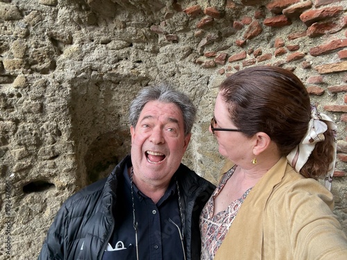 Candid Outdoor Portrait of a Happy Couple on Holiday