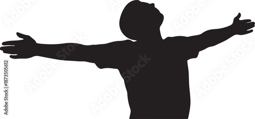 Silhouette of a man with arms outstretched in freedom