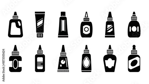 Collection of various glue bottles and tubes in black and white.