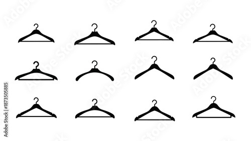 Collection of twelve different clothes hangers on a white background.