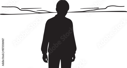 Silhouette of a man in a suit standing alone