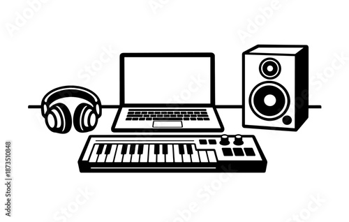 Laptop with midi keyboard, headphones, and speaker for music production